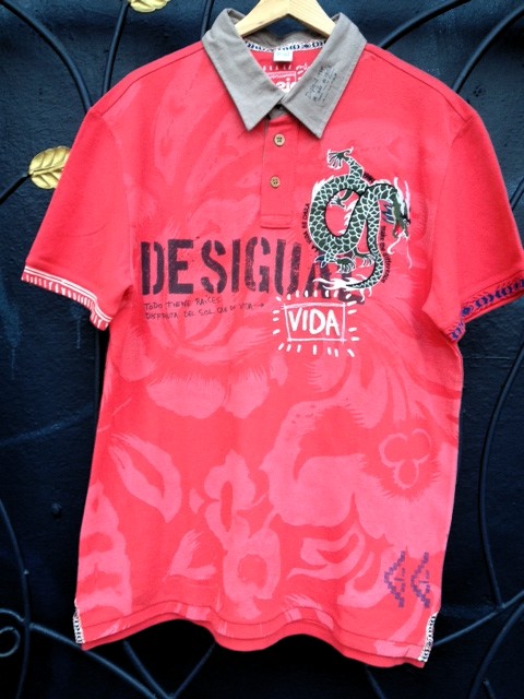 This Desigual "Mawu" polo shirt is available at Angel Vancouver (angelvancouver.com). We ship worldwide.