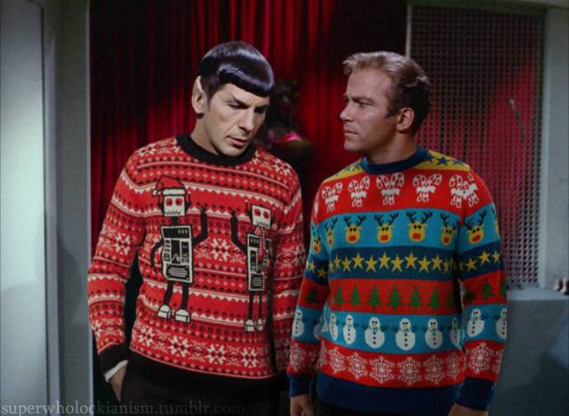 Spock and Captain Kirk wearing their Christmas sweaters Spock.Christmas.robot.sweater.