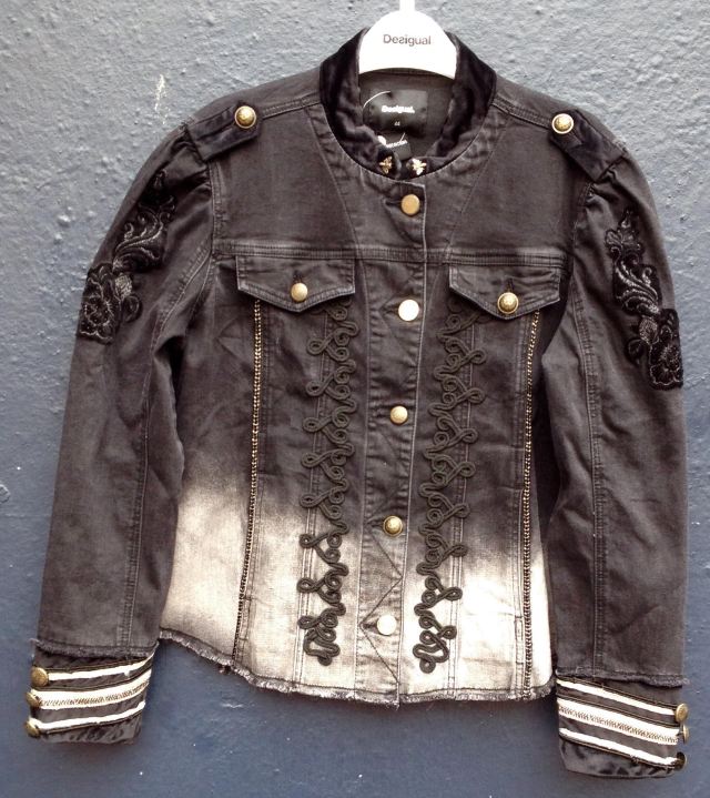 ANGEL IS SOLD OUT OF THIS JACKET. Desigual NAVY black denim coat with brocade detailing, Sgt. Pepper buttons and cuffs. $255.95. We've sold two of these coats and only have two left. Fall-Winter 2017 collection - called Extaordinary. 17WWED01-5009