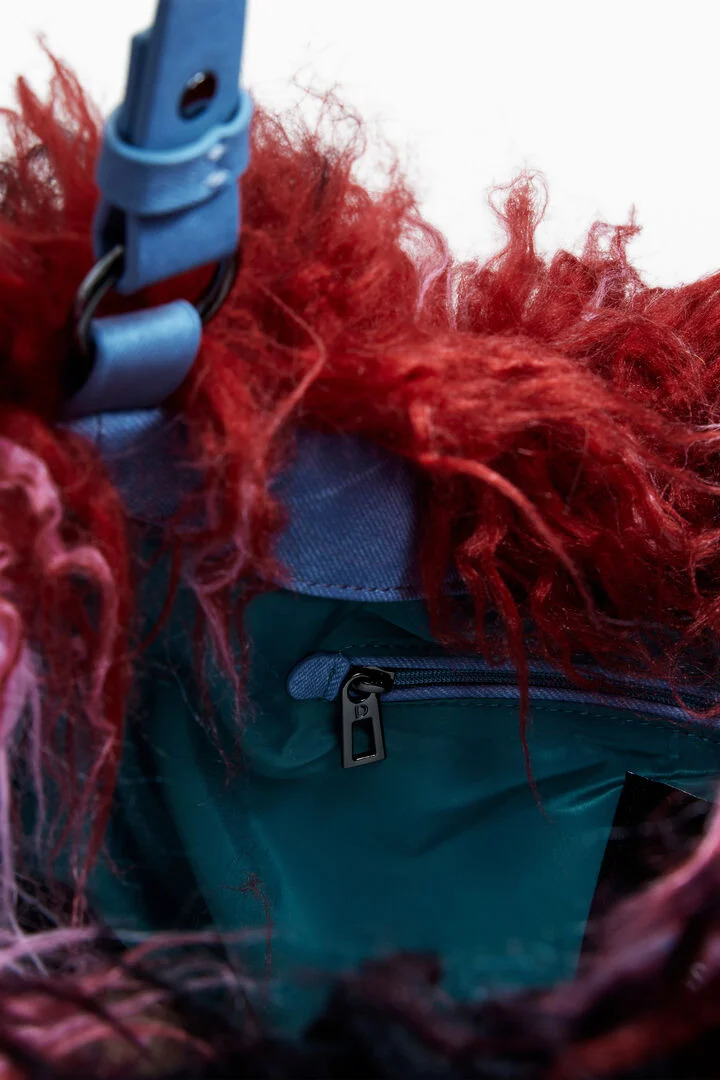 Desigual faux-fur bag designed by Christian Lacroix. $249. FW2025.